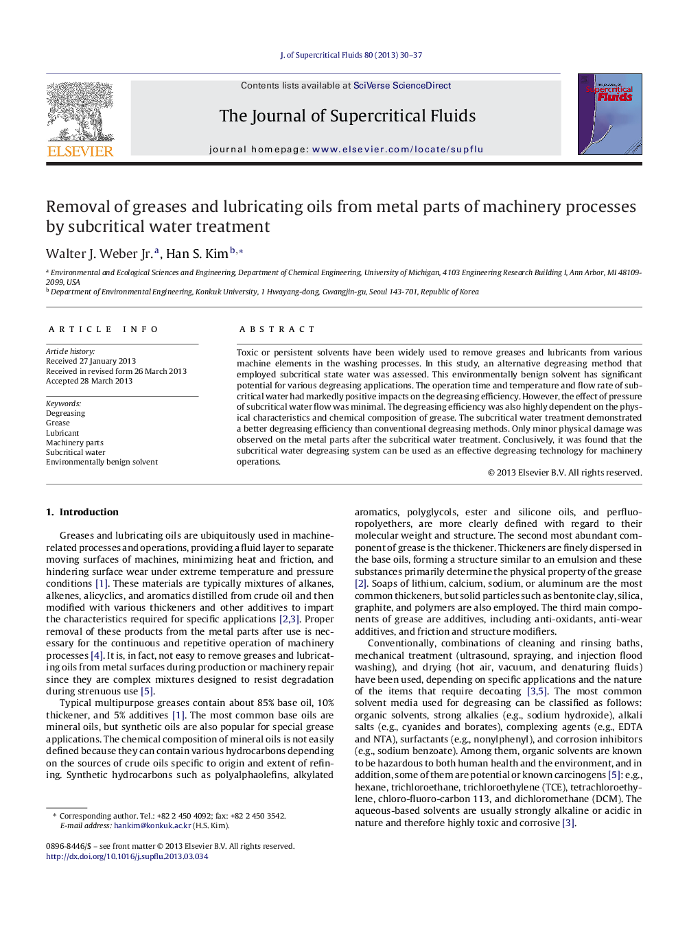 Removal of greases and lubricating oils from metal parts of machinery processes by subcritical water treatment