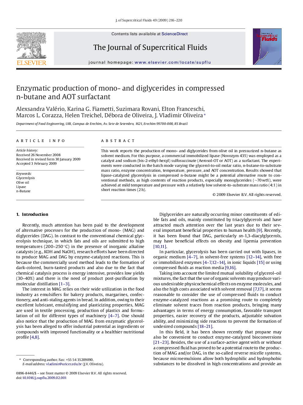 Enzymatic production of mono- and diglycerides in compressed n-butane and AOT surfactant