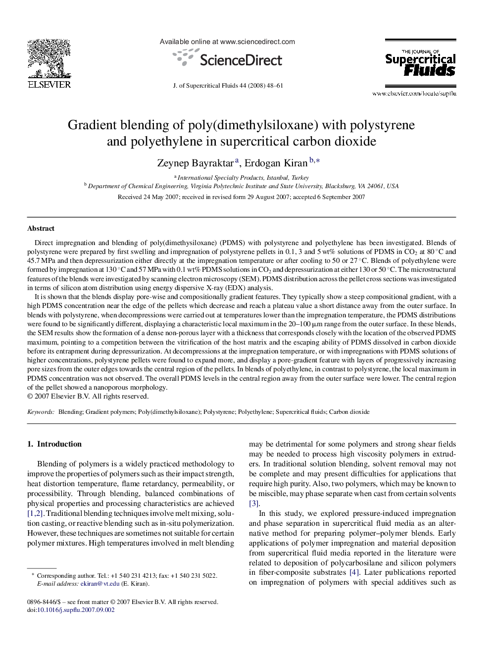 Gradient blending of poly(dimethylsiloxane) with polystyrene and polyethylene in supercritical carbon dioxide