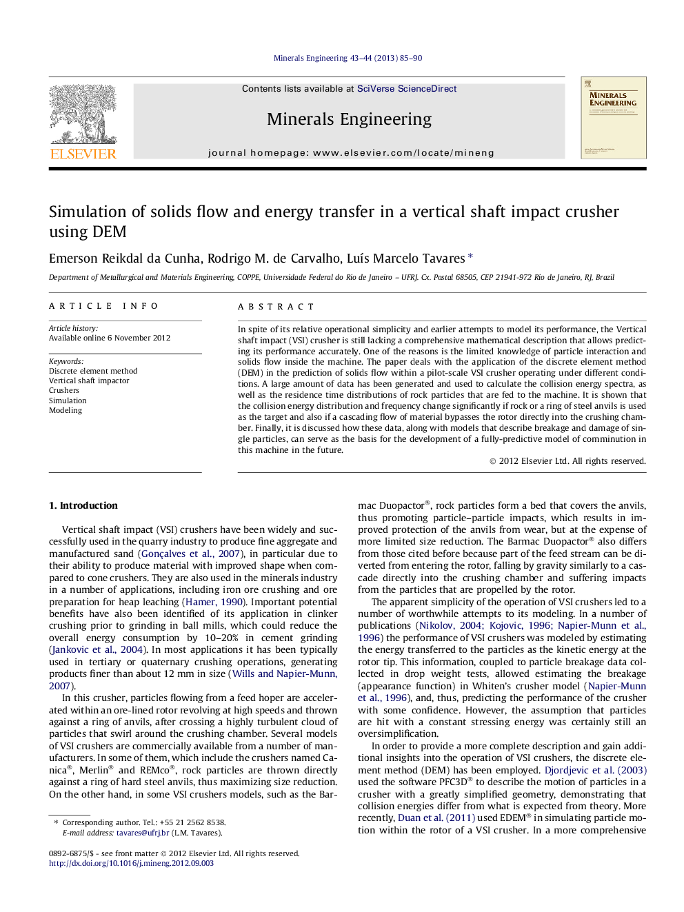 Simulation of solids flow and energy transfer in a vertical shaft impact crusher using DEM