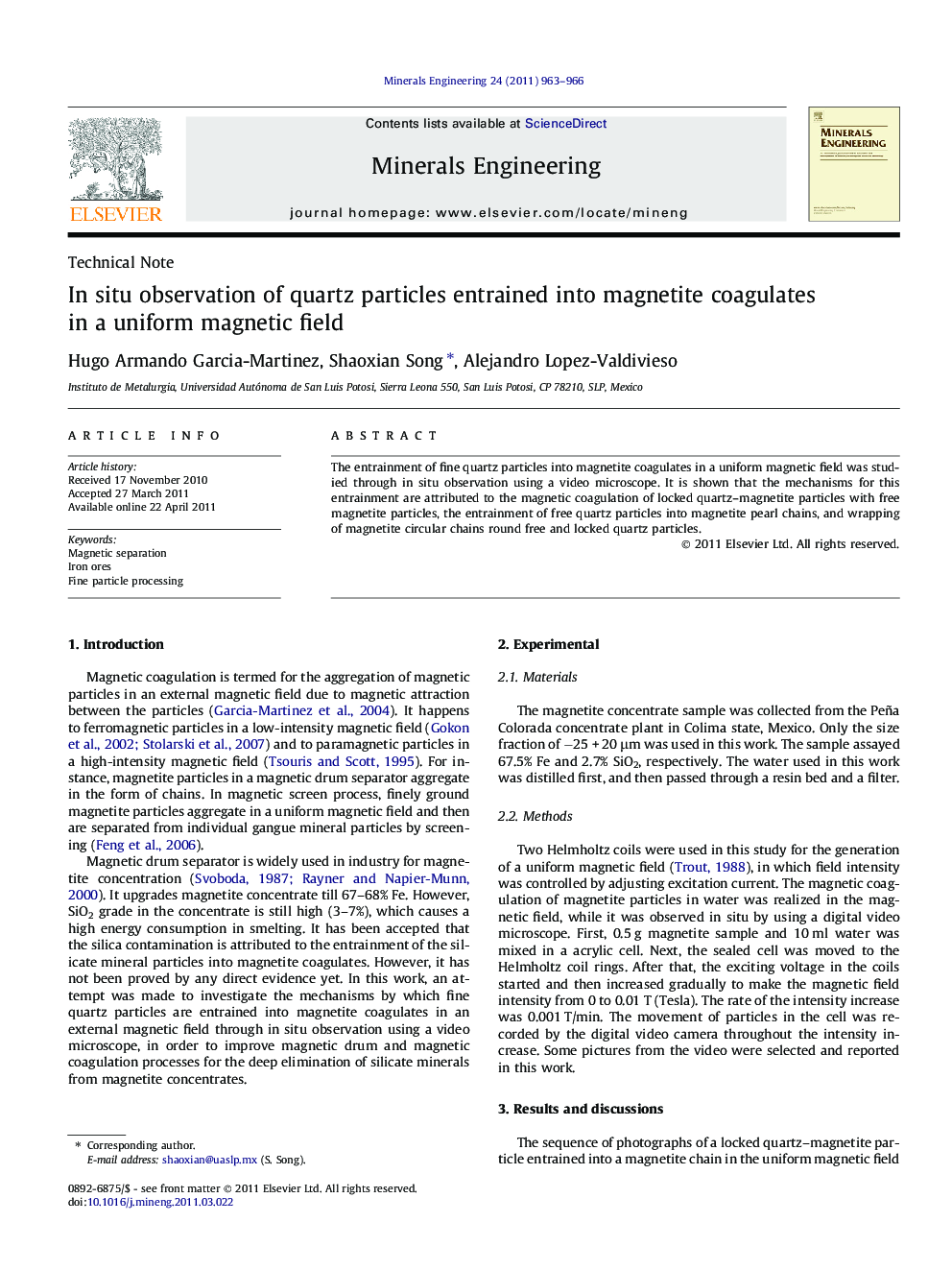 In situ observation of quartz particles entrained into magnetite coagulates in a uniform magnetic field