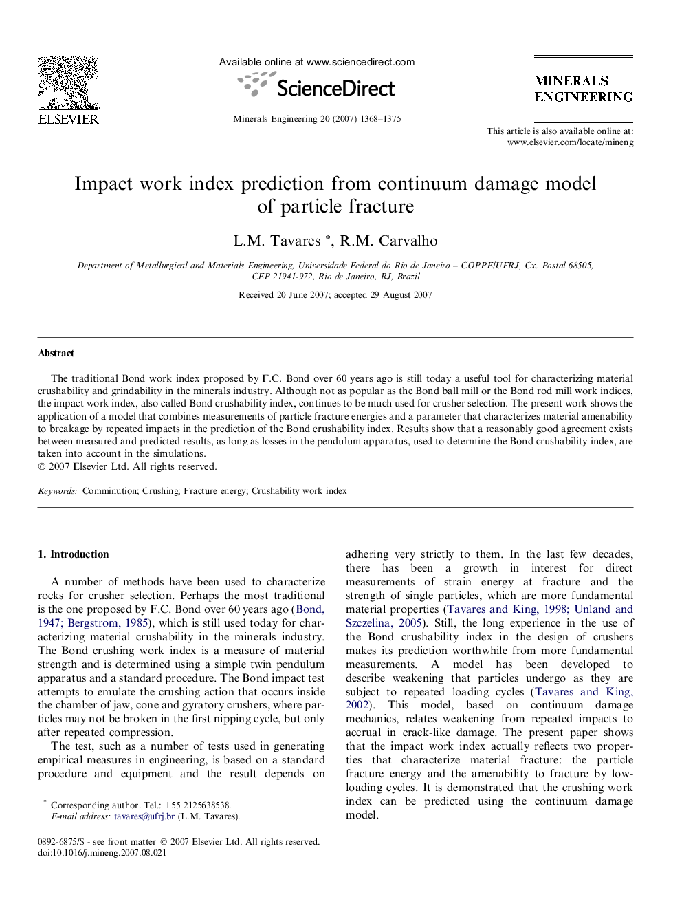 Impact work index prediction from continuum damage model of particle fracture