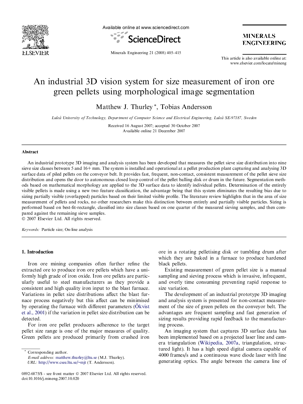 An industrial 3D vision system for size measurement of iron ore green pellets using morphological image segmentation