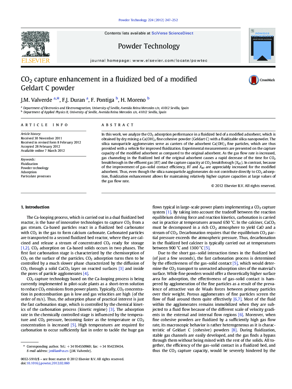 CO2 capture enhancement in a fluidized bed of a modified Geldart C powder