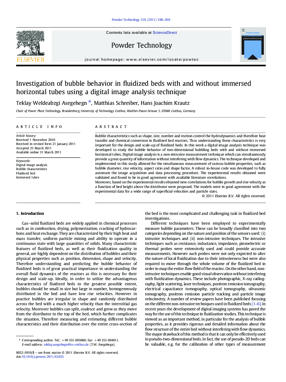 Investigation of bubble behavior in fluidized beds with and without immersed horizontal tubes using a digital image analysis technique