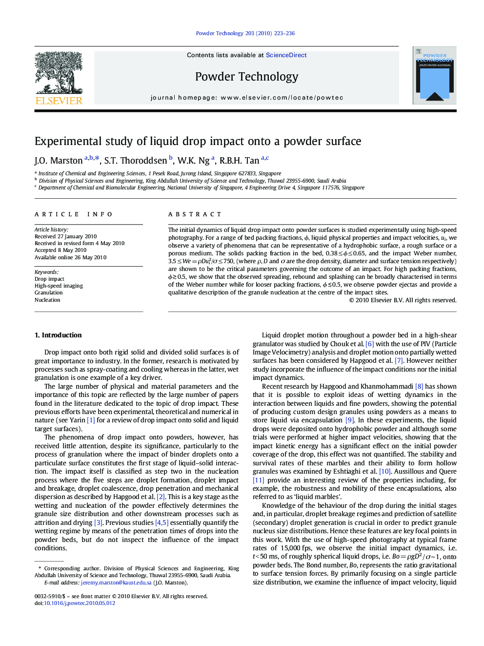 Experimental study of liquid drop impact onto a powder surface