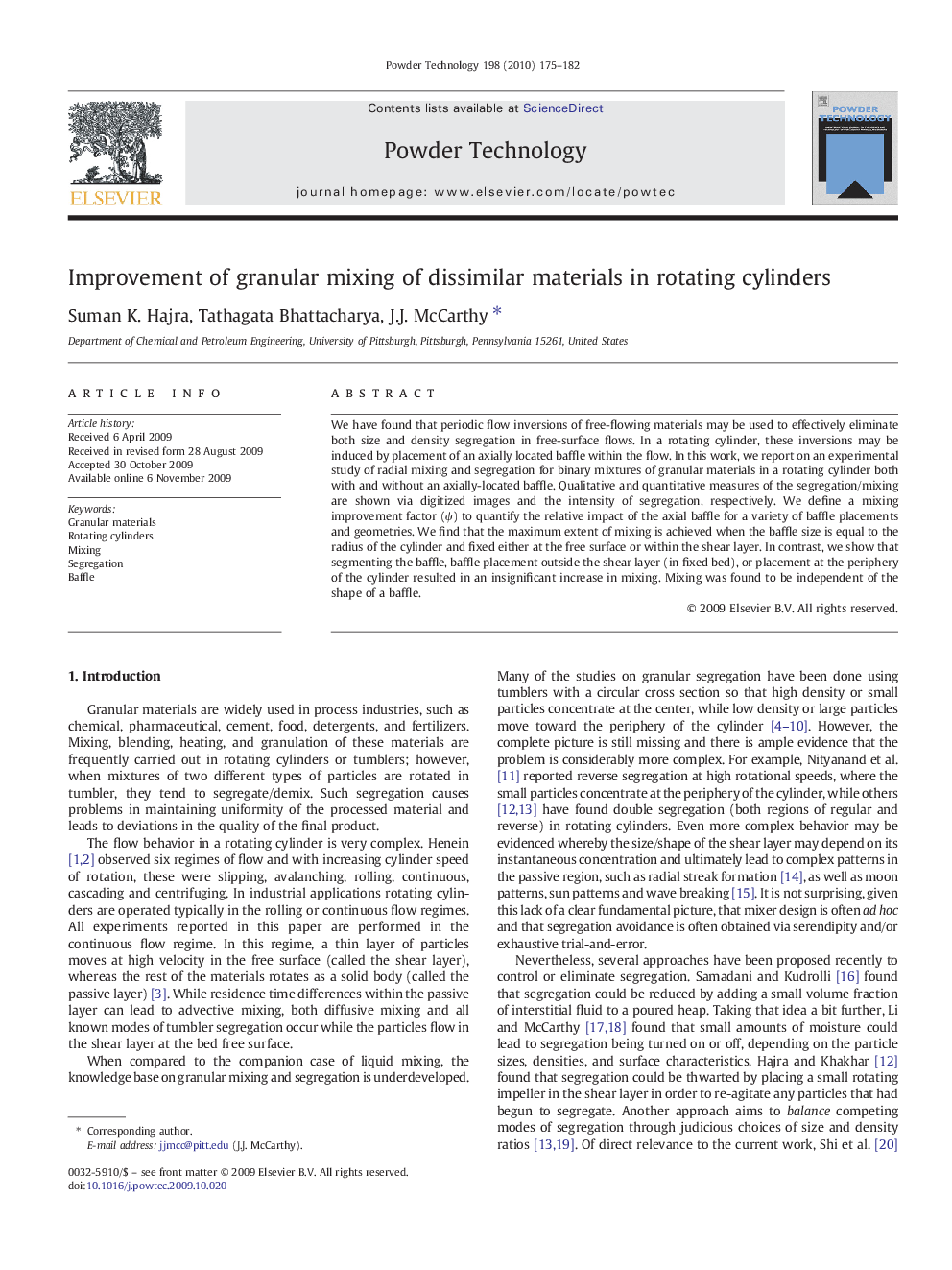 Improvement of granular mixing of dissimilar materials in rotating cylinders