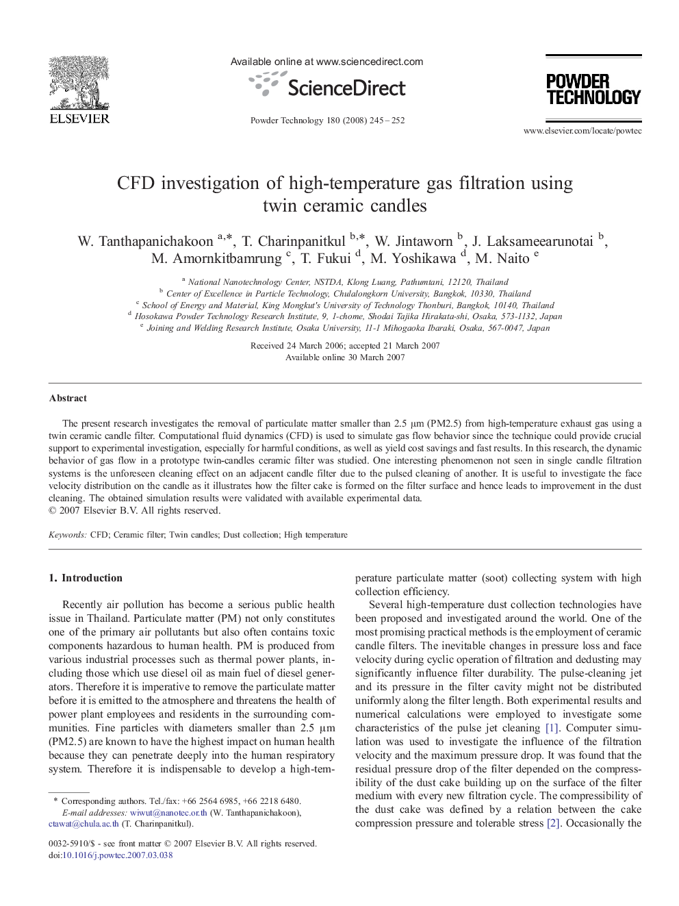 CFD investigation of high-temperature gas filtration using twin ceramic candles