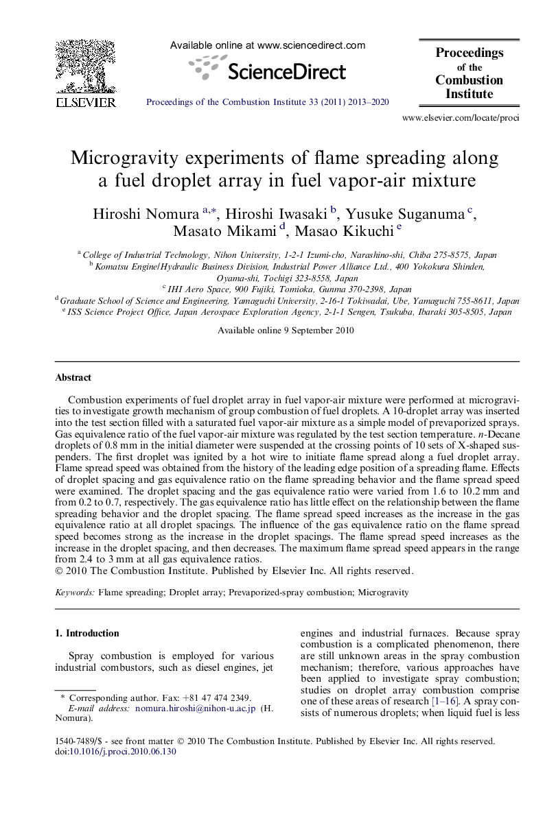 Microgravity experiments of flame spreading along a fuel droplet array in fuel vapor-air mixture