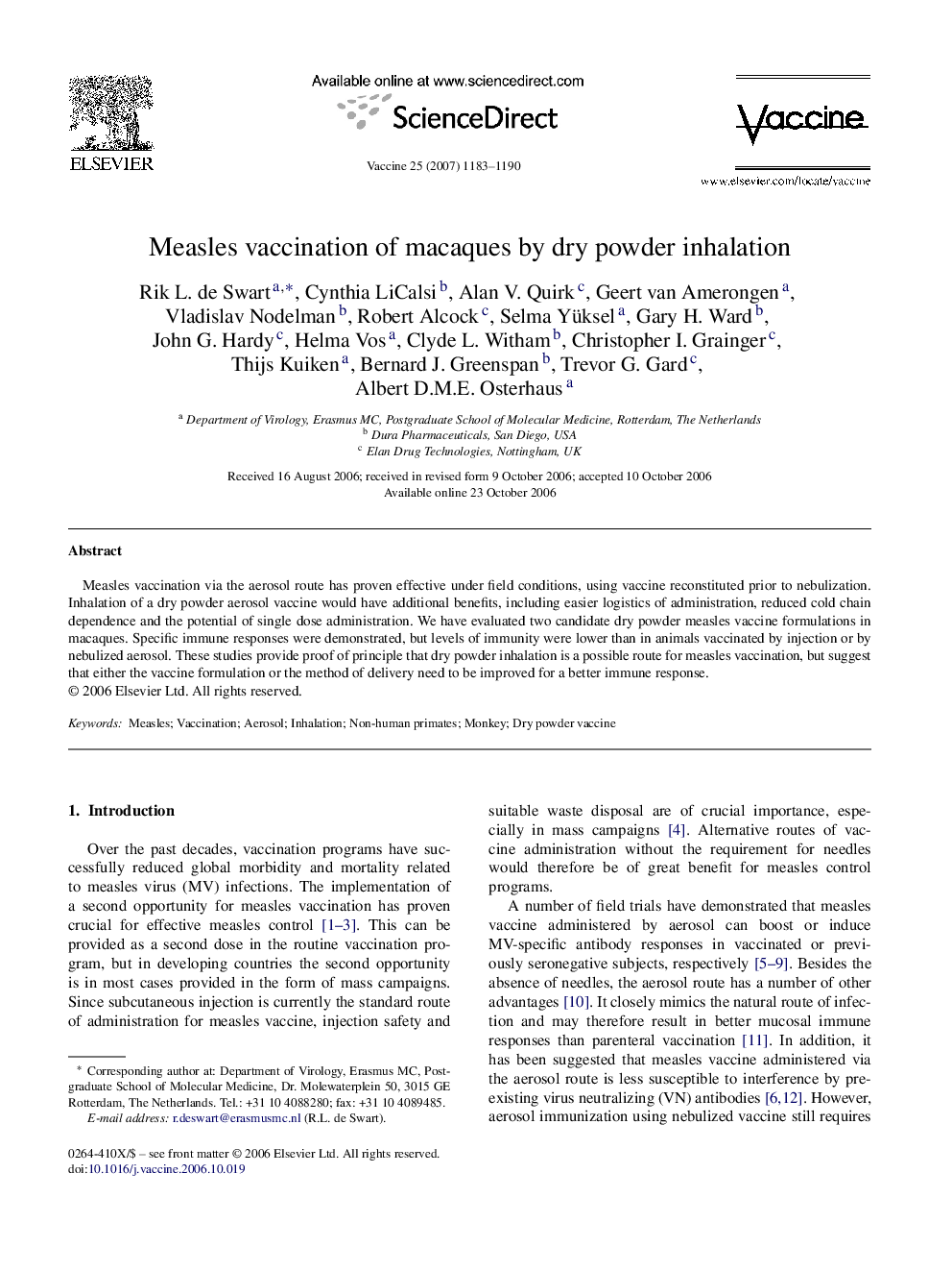 Measles vaccination of macaques by dry powder inhalation