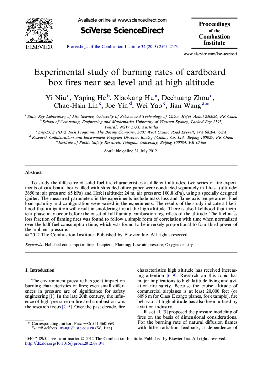 Experimental study of burning rates of cardboard box fires near sea level and at high altitude