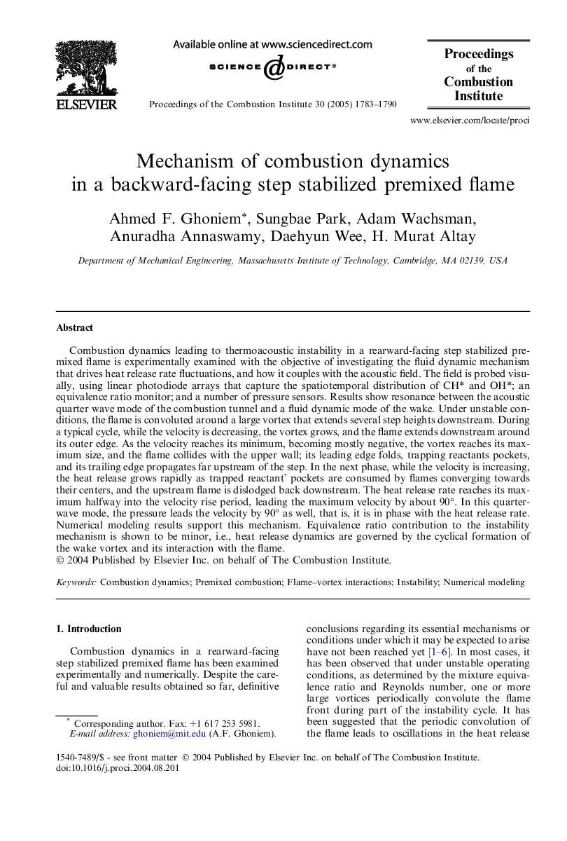 Mechanism of combustion dynamics in a backward-facing step stabilized premixed flame