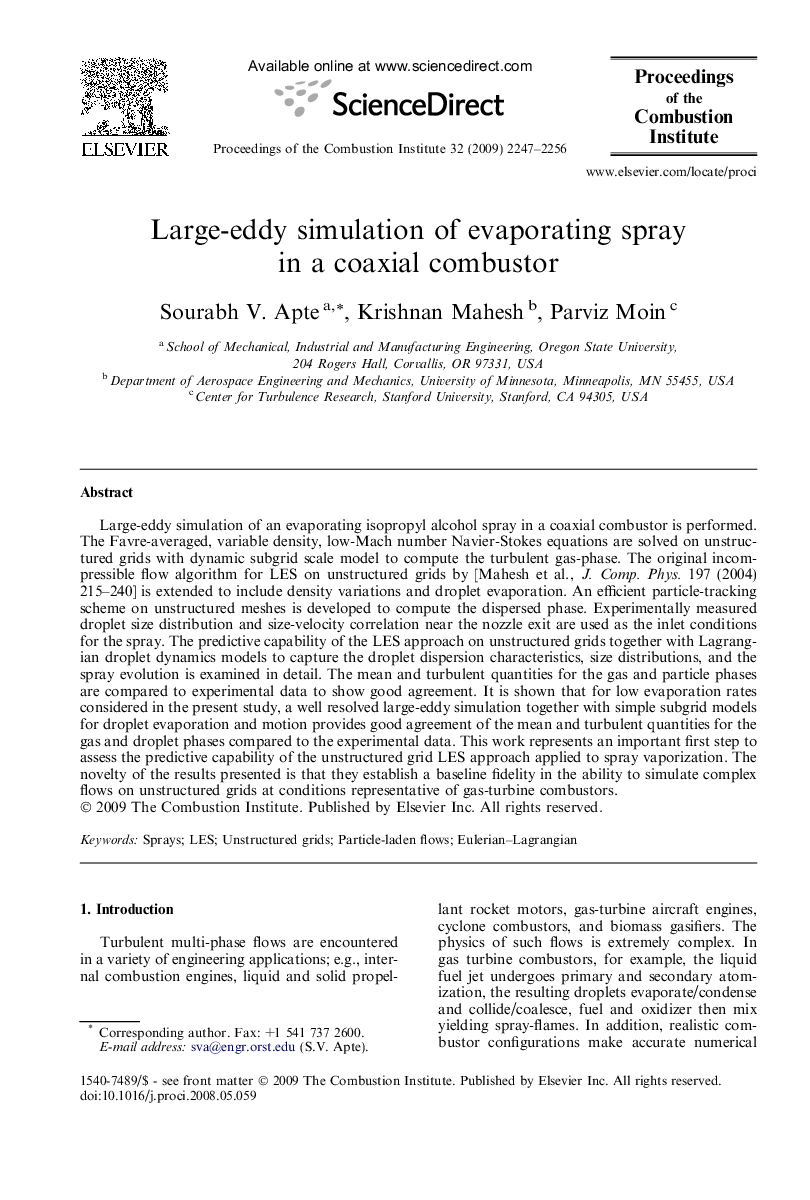 Large-eddy simulation of evaporating spray in a coaxial combustor