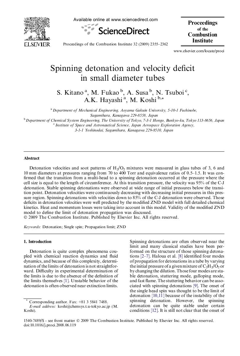 Spinning detonation and velocity deficit in small diameter tubes