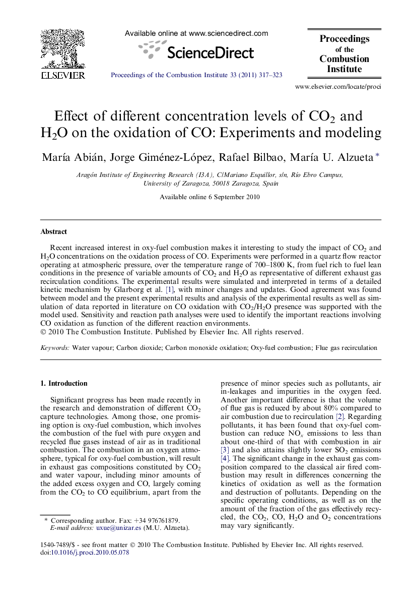 Effect of different concentration levels of CO2 and H2O on the oxidation of CO: Experiments and modeling