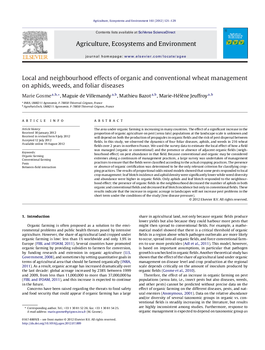 Local and neighbourhood effects of organic and conventional wheat management on aphids, weeds, and foliar diseases