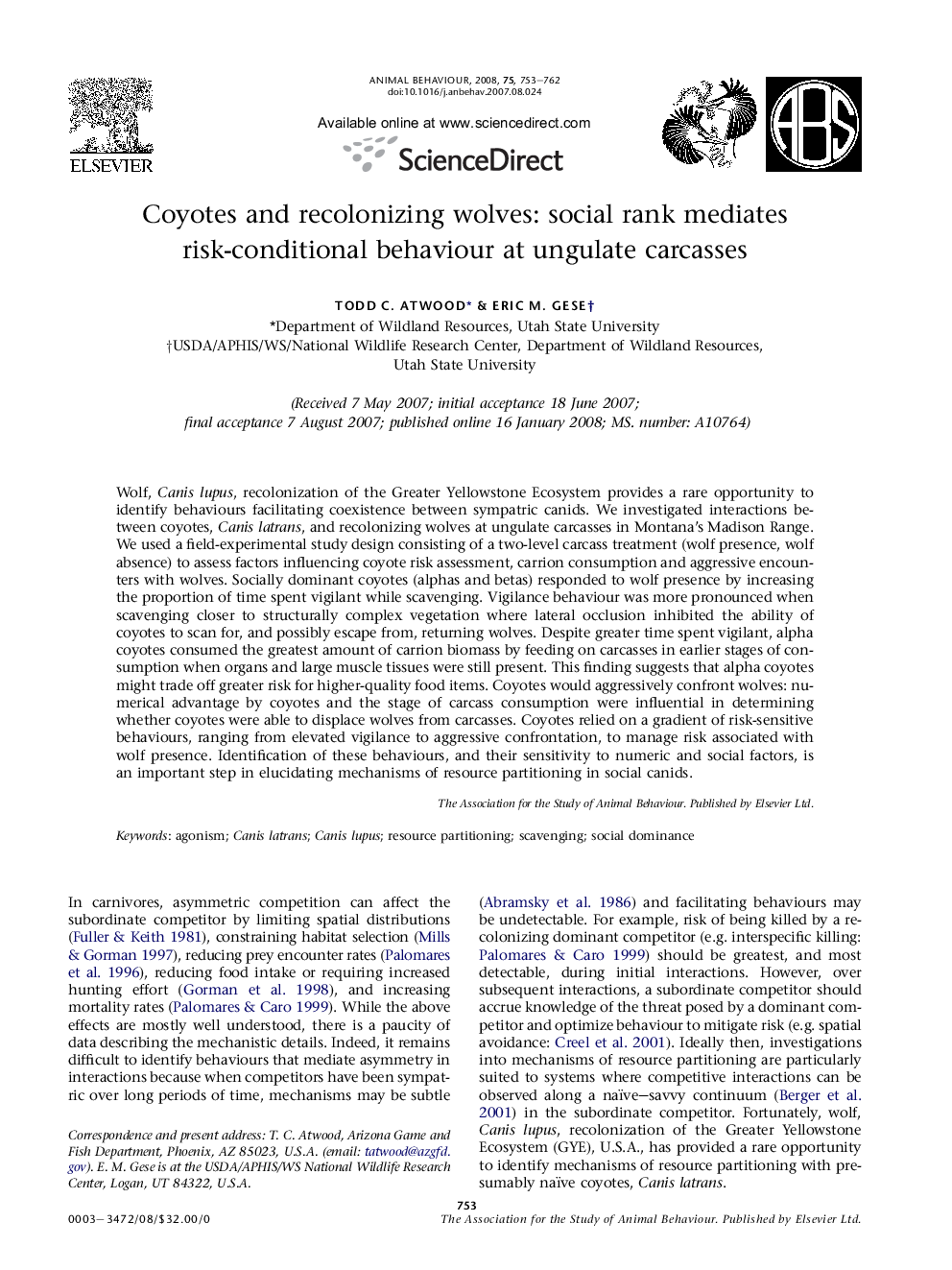 Coyotes and recolonizing wolves: social rank mediates risk-conditional behaviour at ungulate carcasses