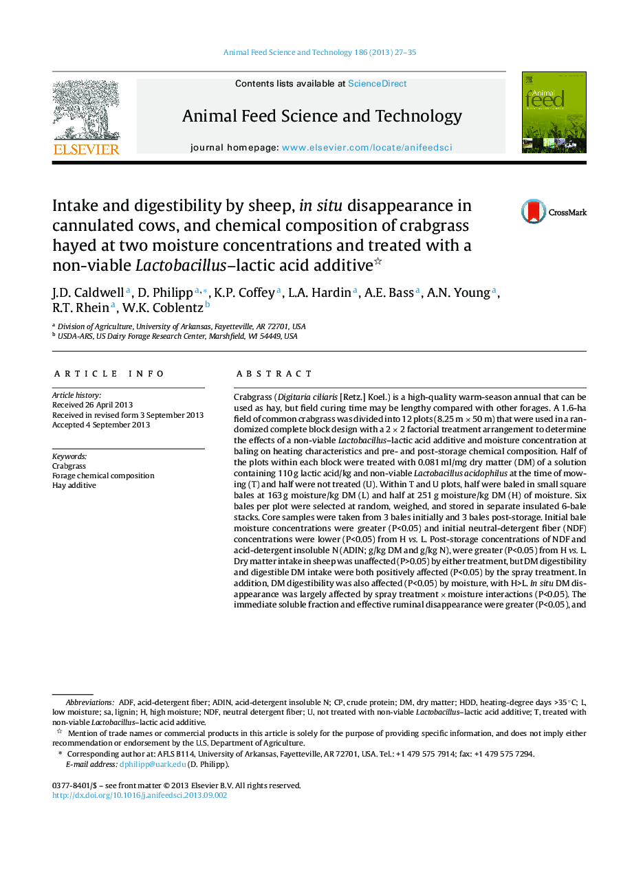 Intake and digestibility by sheep, in situ disappearance in cannulated cows, and chemical composition of crabgrass hayed at two moisture concentrations and treated with a non-viable Lactobacillus–lactic acid additive 