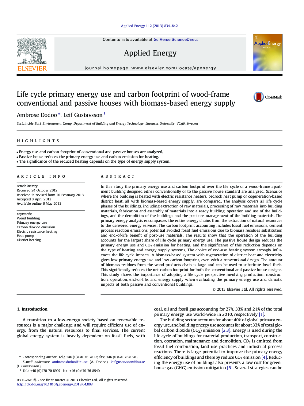 Life cycle primary energy use and carbon footprint of wood-frame conventional and passive houses with biomass-based energy supply