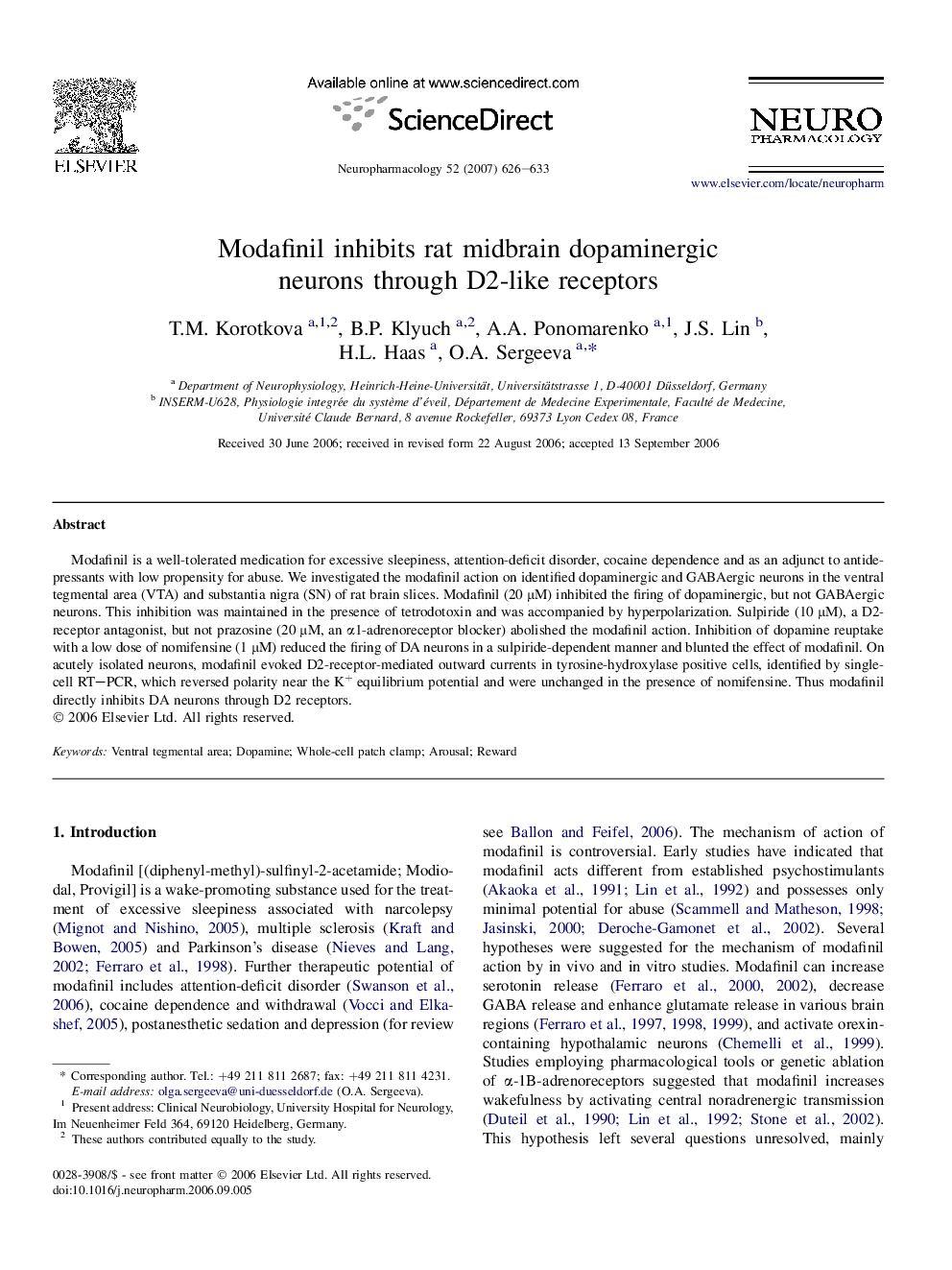 Modafinil inhibits rat midbrain dopaminergic neurons through D2-like receptors