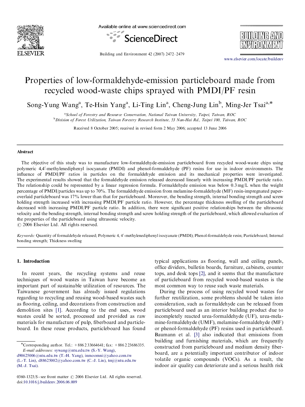 Properties of low-formaldehyde-emission particleboard made from recycled wood-waste chips sprayed with PMDI/PF resin