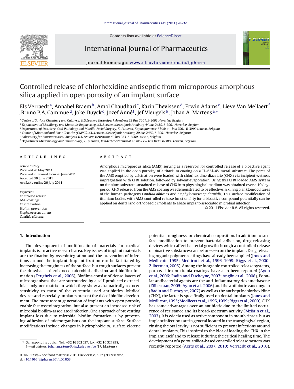 Controlled release of chlorhexidine antiseptic from microporous amorphous silica applied in open porosity of an implant surface