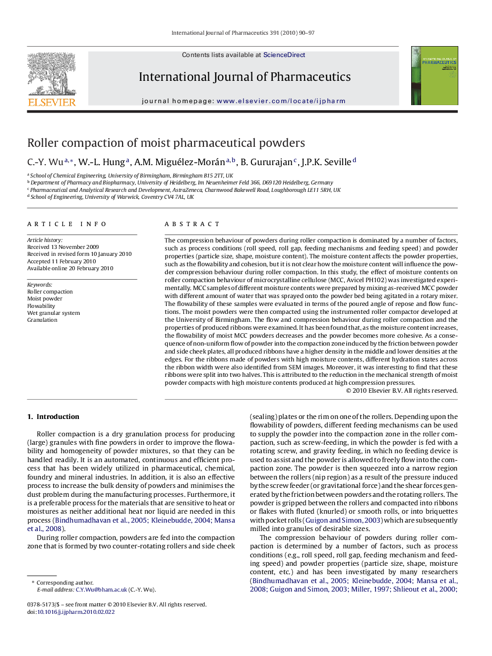 Roller compaction of moist pharmaceutical powders