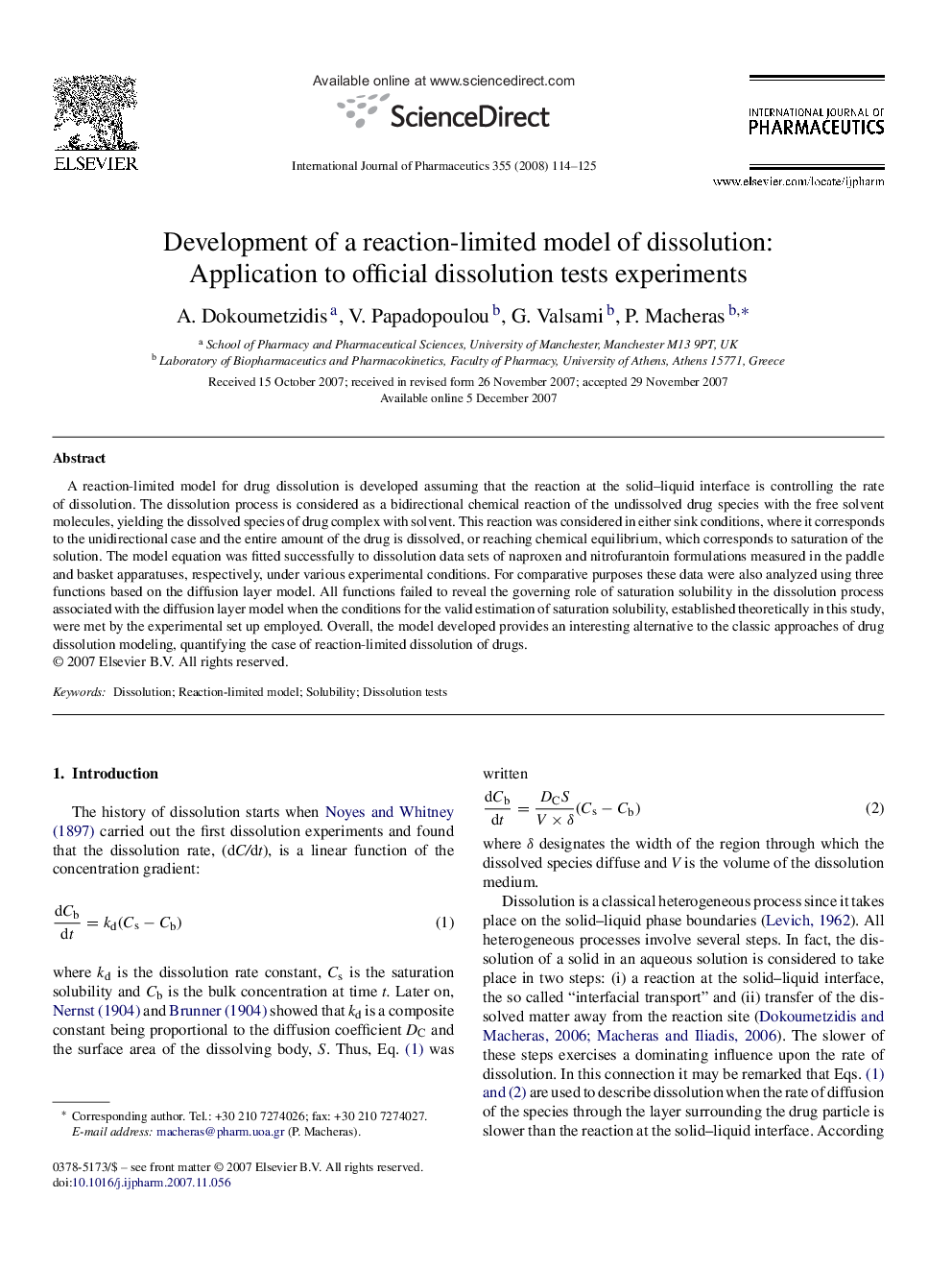 Development of a reaction-limited model of dissolution: Application to official dissolution tests experiments