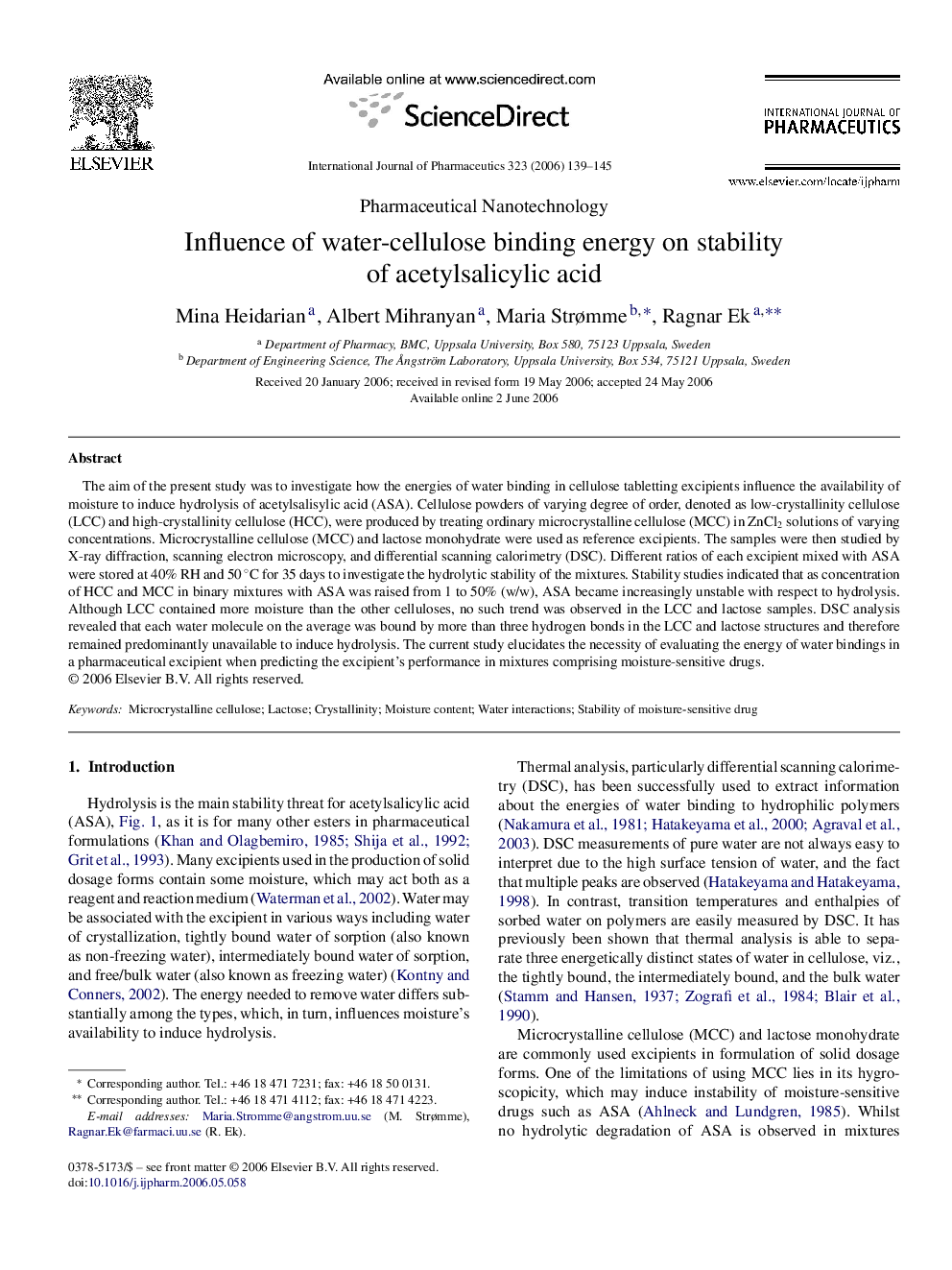 Influence of water-cellulose binding energy on stability of acetylsalicylic acid