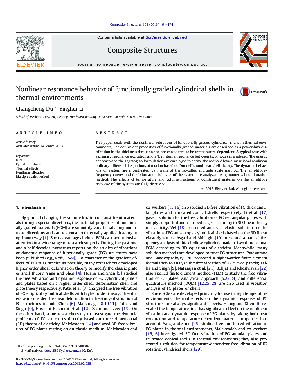 Nonlinear resonance behavior of functionally graded cylindrical shells in thermal environments