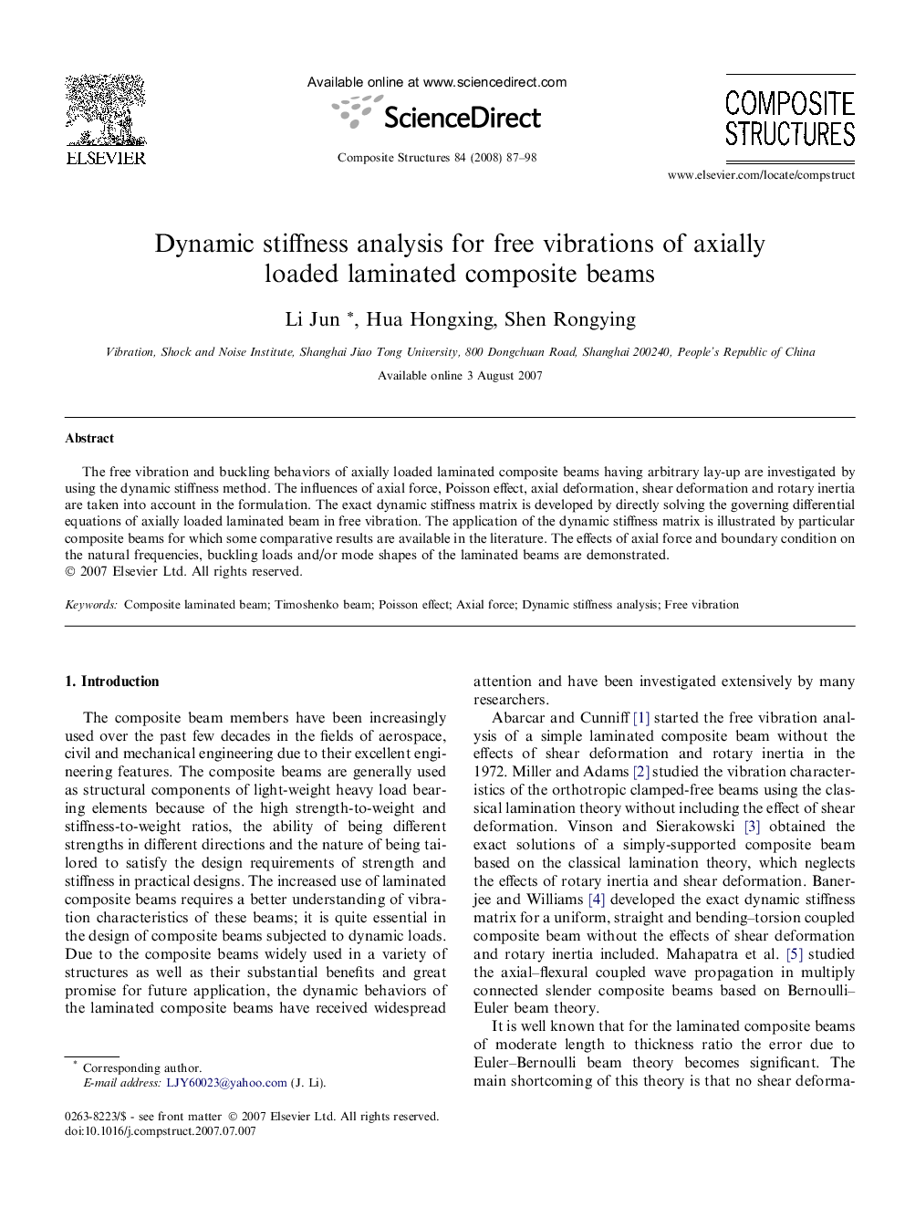 Dynamic stiffness analysis for free vibrations of axially loaded laminated composite beams