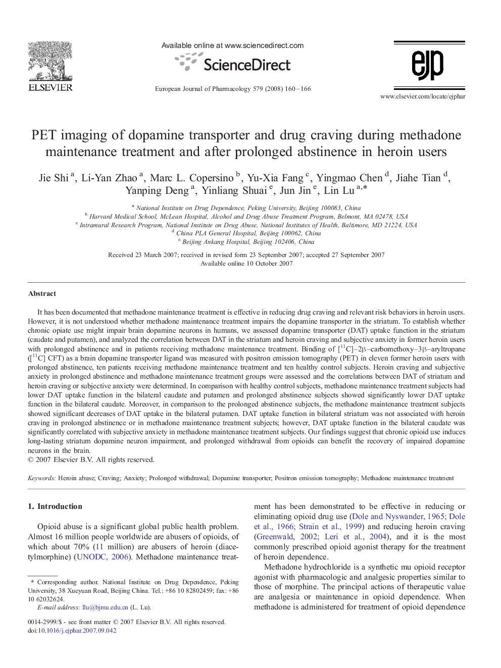 PET imaging of dopamine transporter and drug craving during methadone maintenance treatment and after prolonged abstinence in heroin users