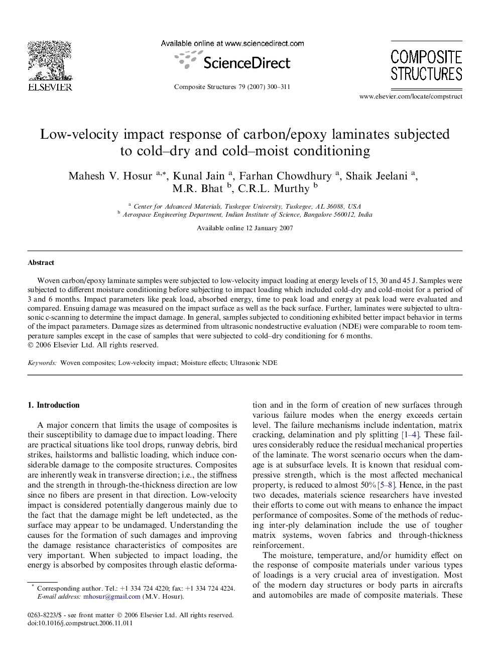 Low-velocity impact response of carbon/epoxy laminates subjected to cold–dry and cold–moist conditioning