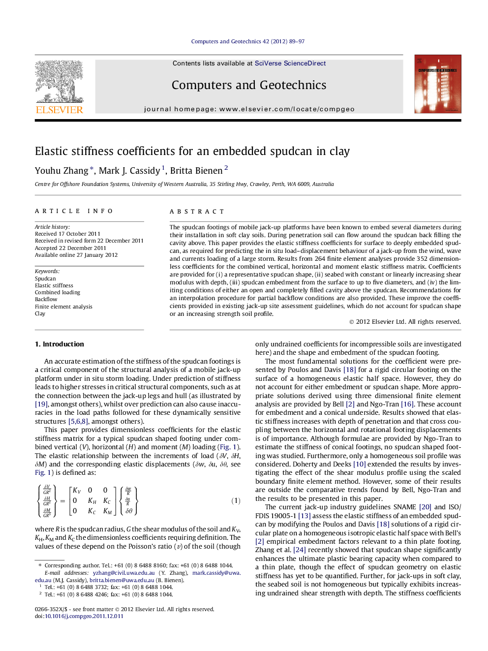 Elastic stiffness coefficients for an embedded spudcan in clay