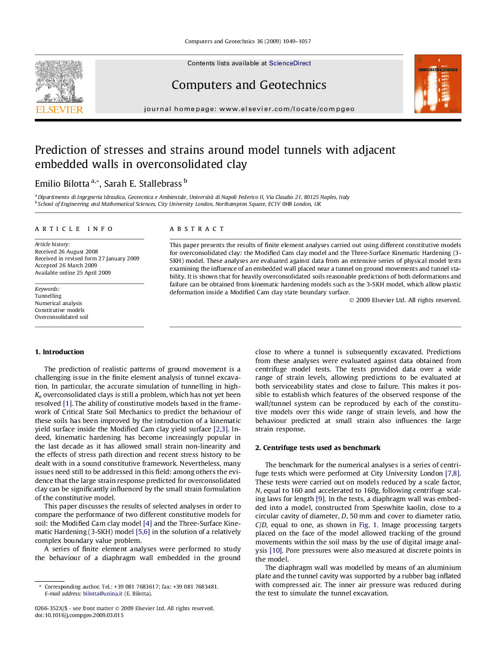 Prediction of stresses and strains around model tunnels with adjacent embedded walls in overconsolidated clay