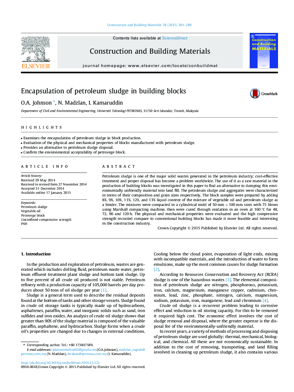 Encapsulation of petroleum sludge in building blocks