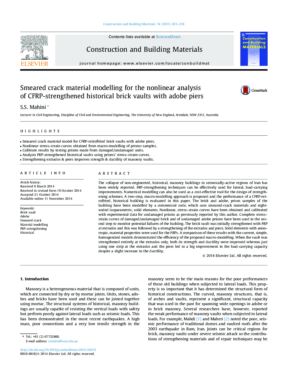 Smeared crack material modelling for the nonlinear analysis of CFRP-strengthened historical brick vaults with adobe piers