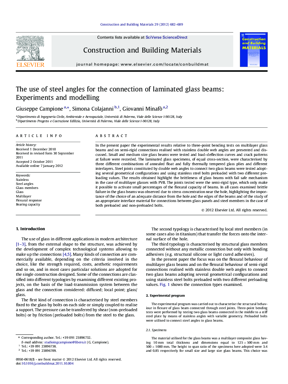 The use of steel angles for the connection of laminated glass beams: Experiments and modelling