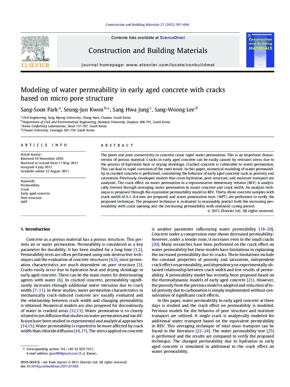 Modeling of water permeability in early aged concrete with cracks based on micro pore structure