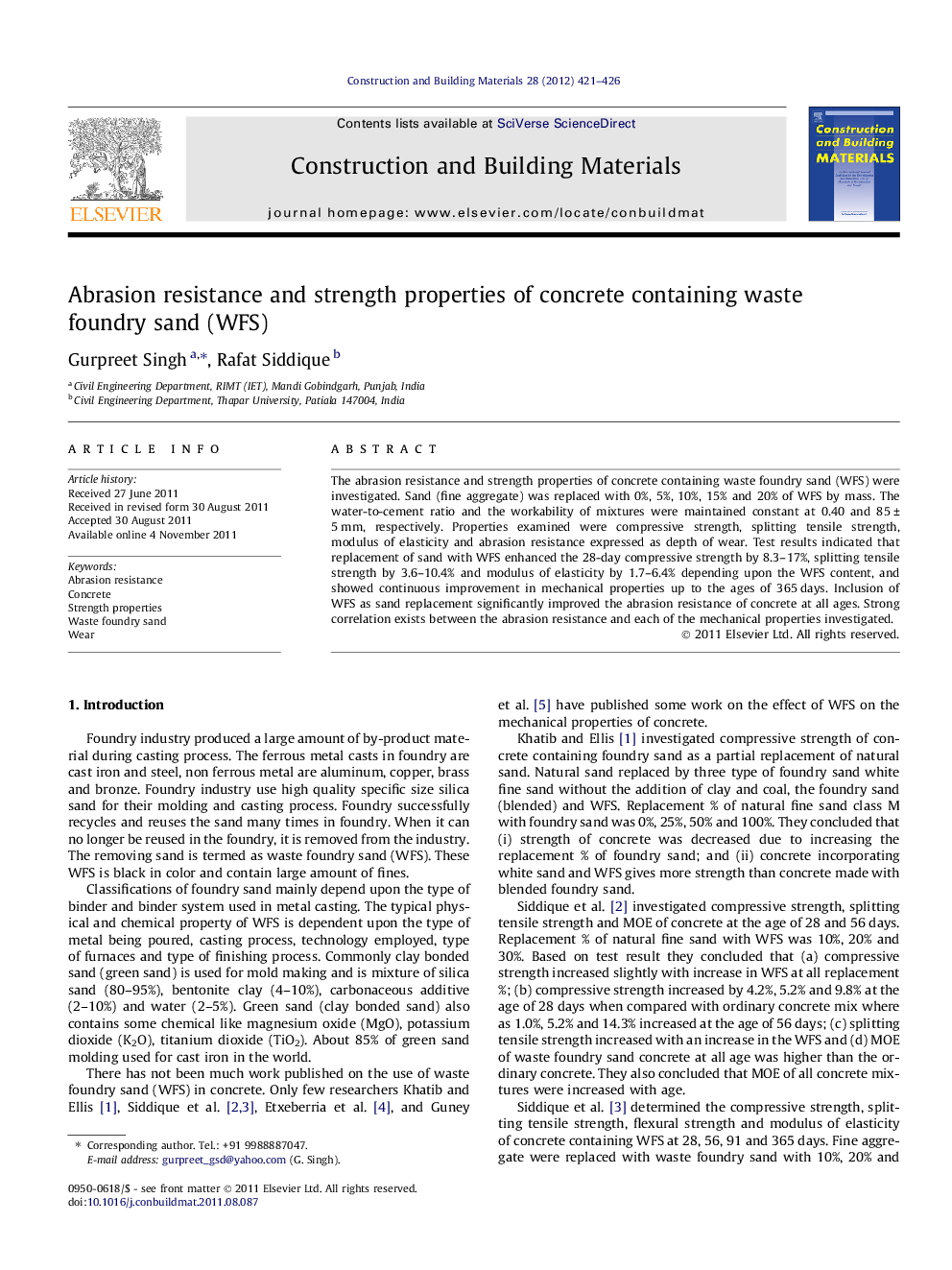 Abrasion resistance and strength properties of concrete containing waste foundry sand (WFS)