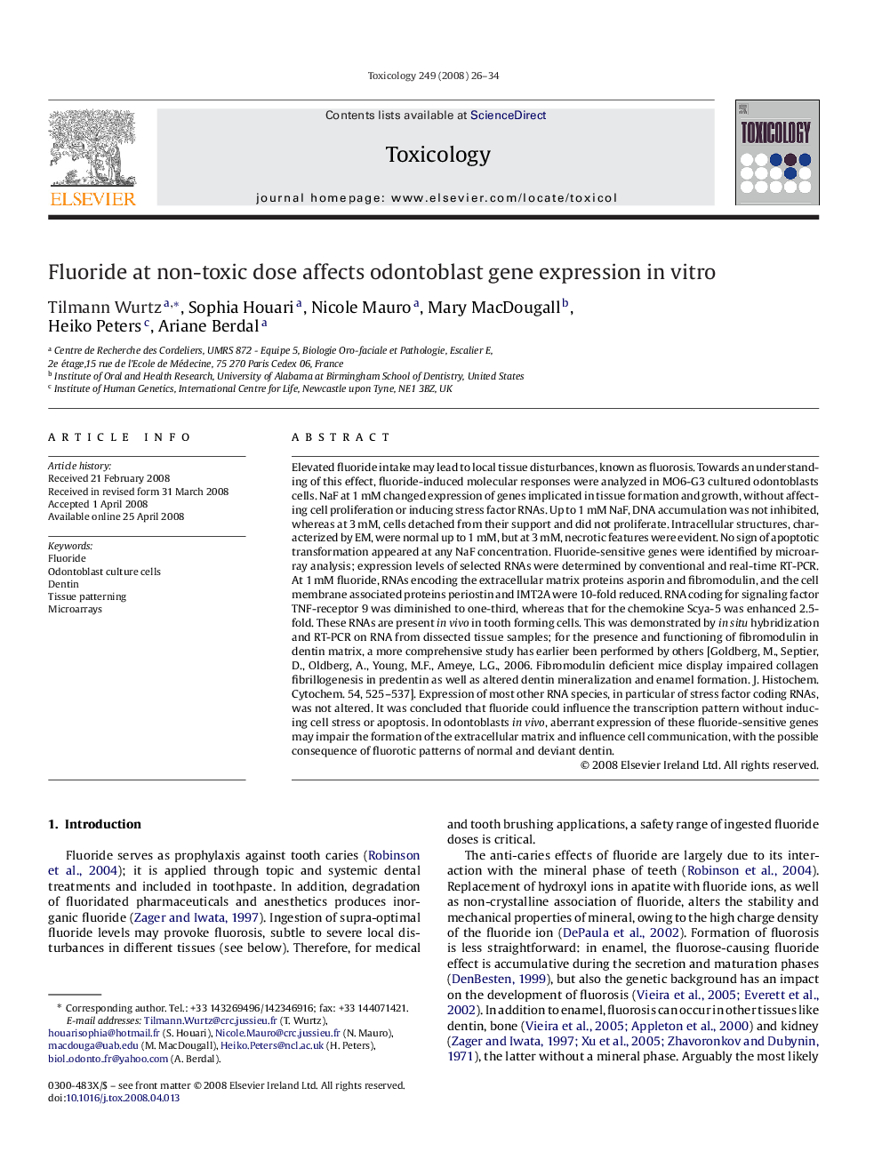 Fluoride at non-toxic dose affects odontoblast gene expression in vitro