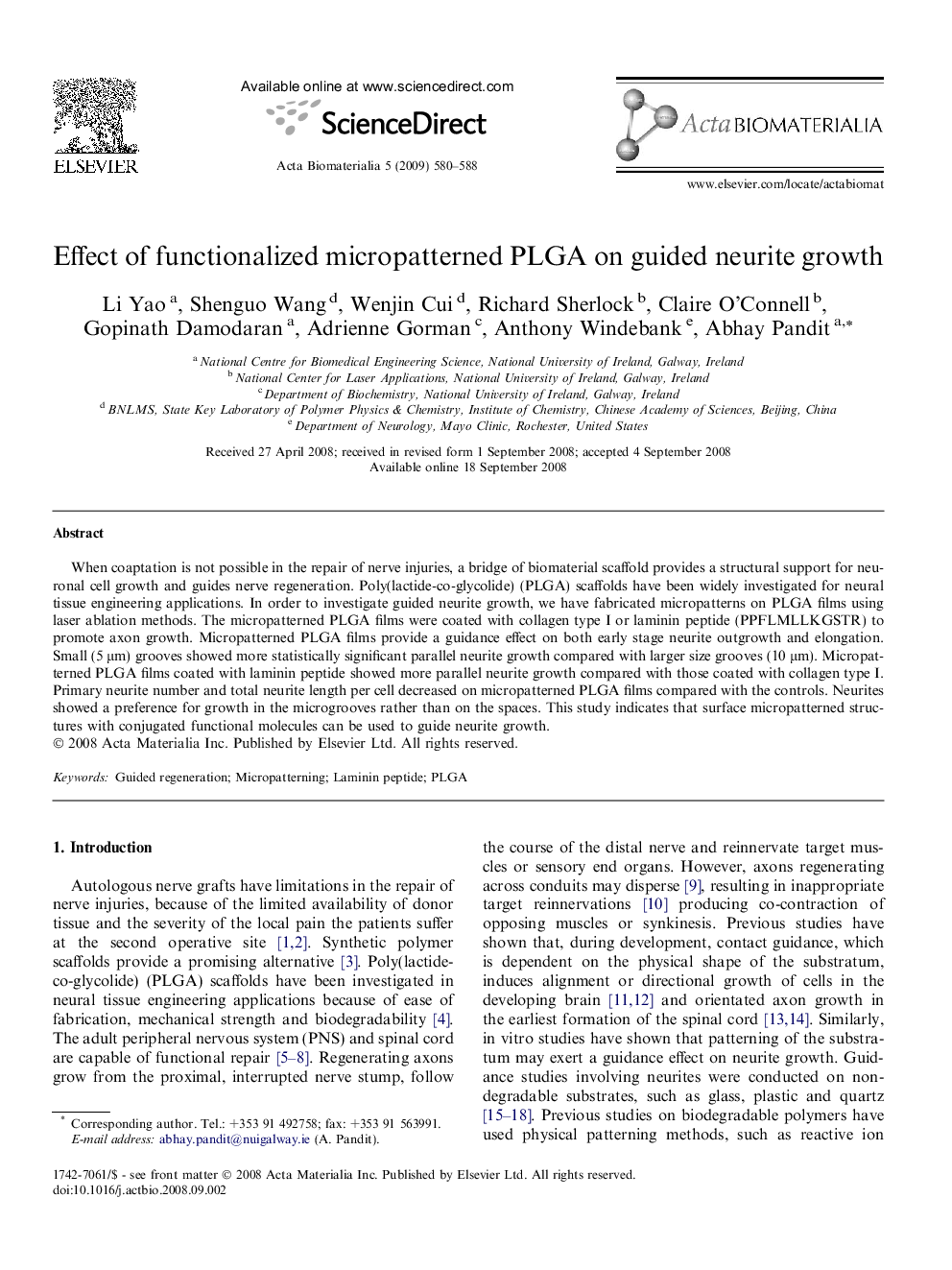 Effect of functionalized micropatterned PLGA on guided neurite growth