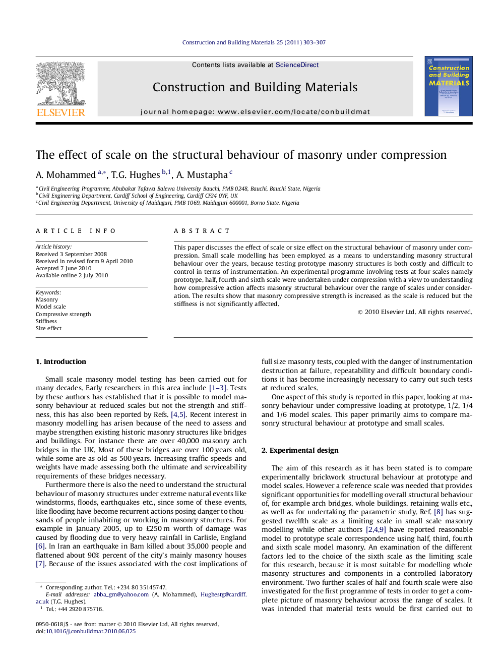 The effect of scale on the structural behaviour of masonry under compression