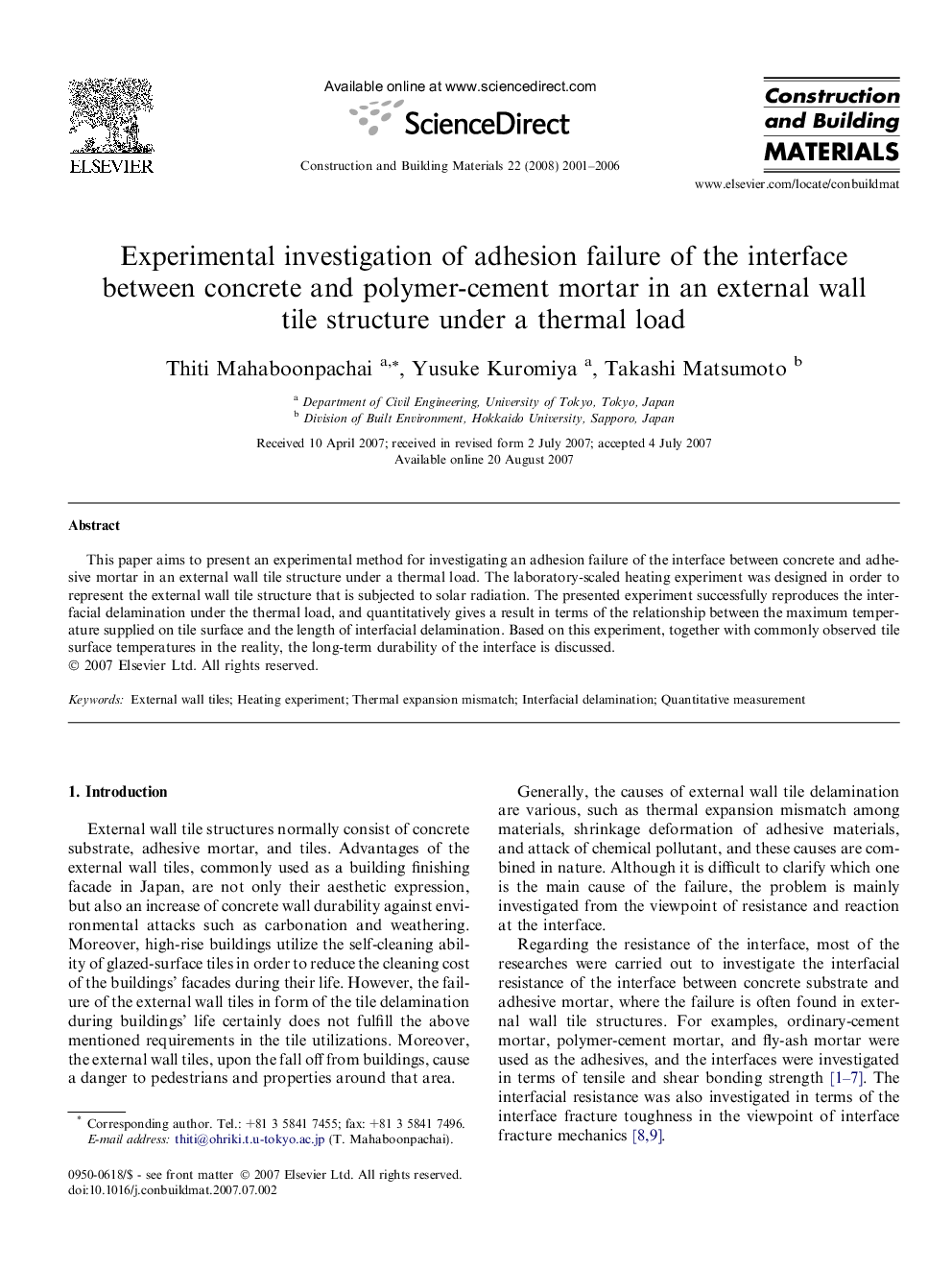 Experimental investigation of adhesion failure of the interface between concrete and polymer-cement mortar in an external wall tile structure under a thermal load