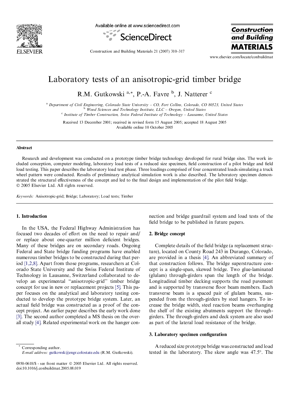 Laboratory tests of an anisotropic-grid timber bridge