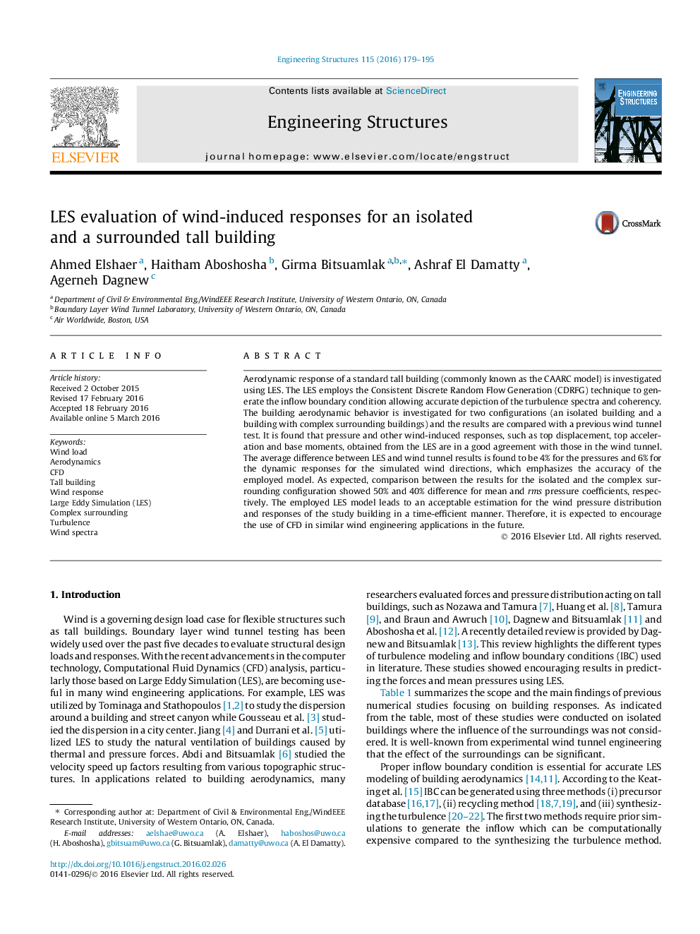 LES evaluation of wind-induced responses for an isolated and a surrounded tall building