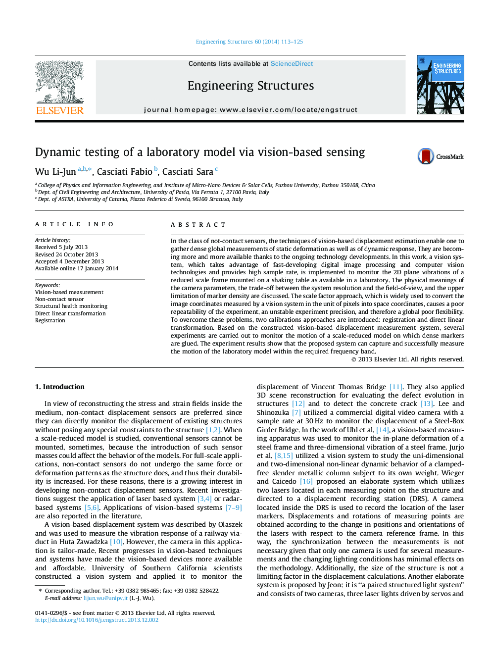 Dynamic testing of a laboratory model via vision-based sensing