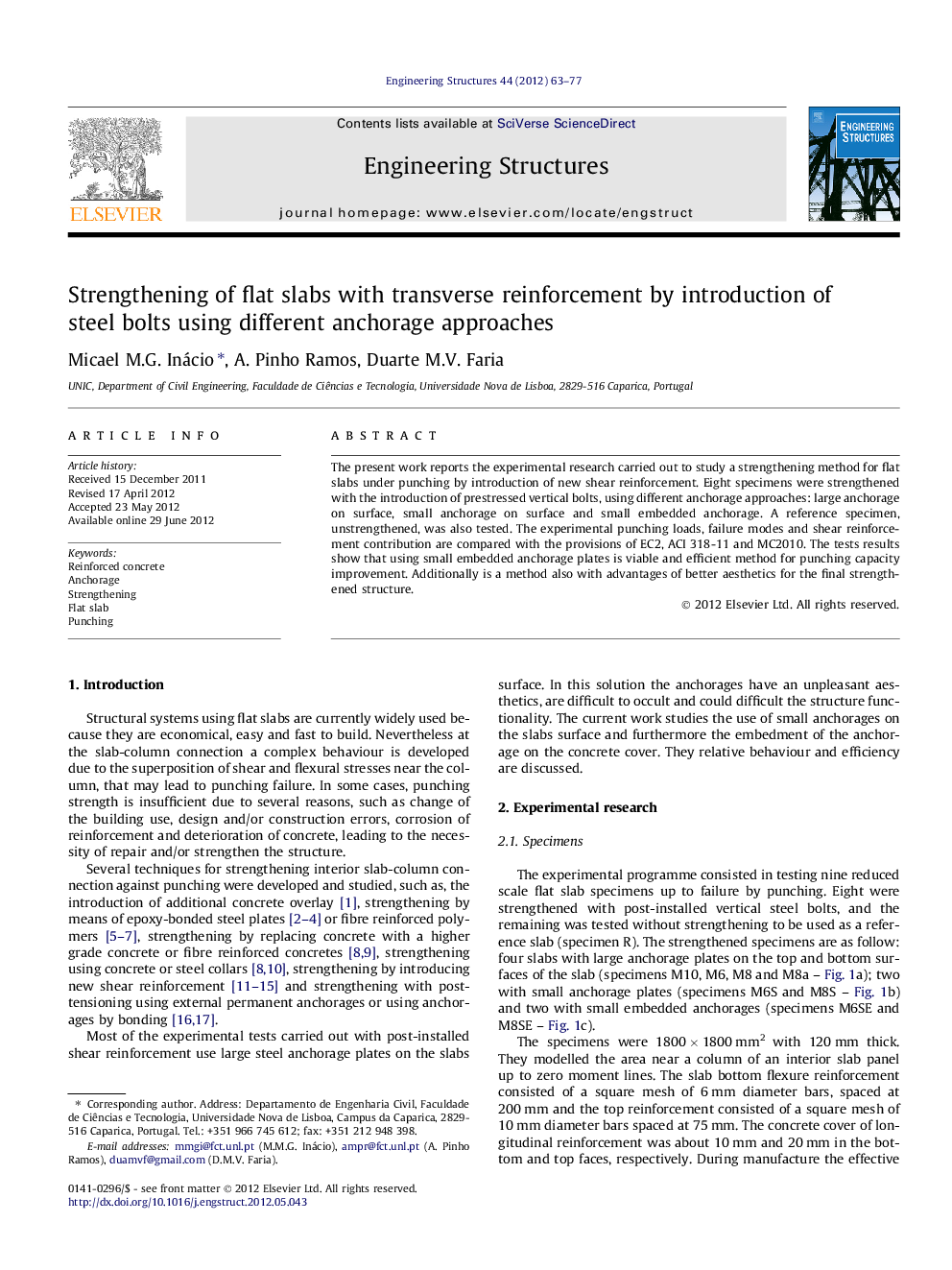 Strengthening of flat slabs with transverse reinforcement by introduction of steel bolts using different anchorage approaches