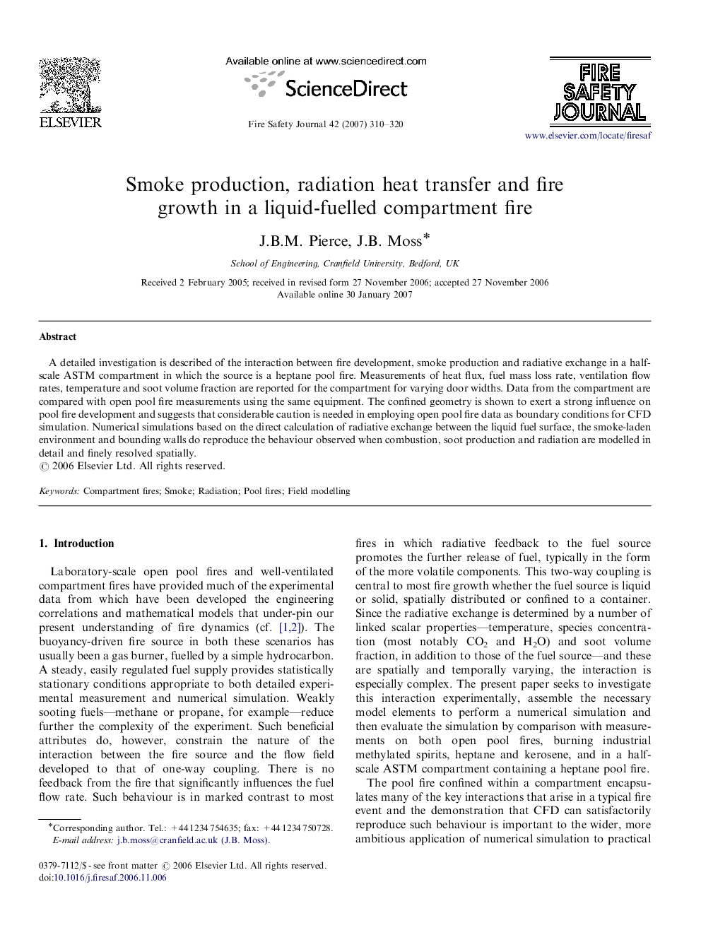 Smoke production, radiation heat transfer and fire growth in a liquid-fuelled compartment fire