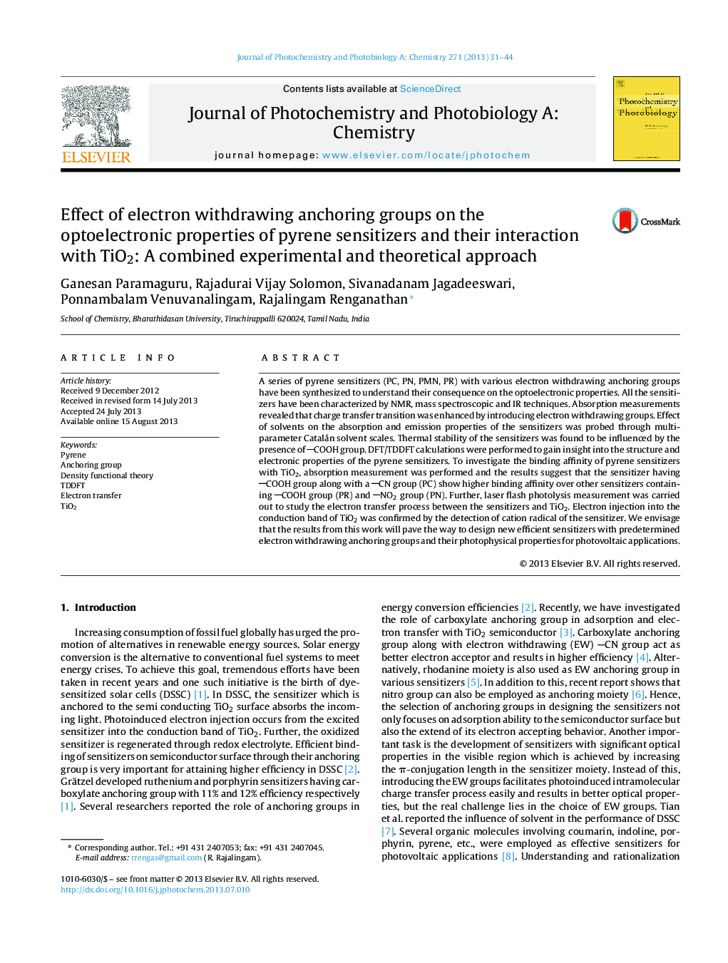 Effect of electron withdrawing anchoring groups on the optoelectronic properties of pyrene sensitizers and their interaction with TiO2: A combined experimental and theoretical approach